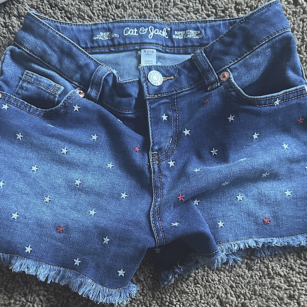 Blue Jean short, red,white,blue stars (super stretch) 9$
